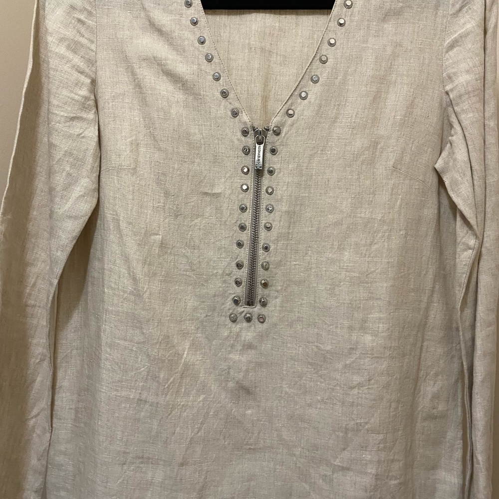 Michael Kors stylish 3/4 length top, Front & side zippers and sleeve zippers .